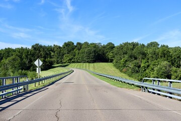 The empty road in the country on a sunny day.