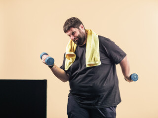 obese young man plays sports in an online class