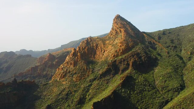 Paradise for hikers. Beautiful trek to gorge, Risco Blanco. Buenavista del Norte. Great place for leisure activity. Wide aerial view of clay rock. National Teno Park. Mountains, vegetation in spring.