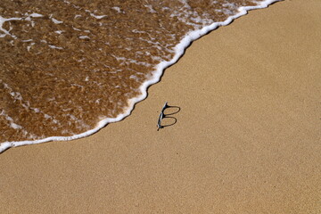 Footprints in the sand on the shores of the Mediterranean Sea.