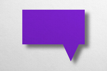Fototapeta na wymiar purple paper cut speech balloon shape isolated on white background