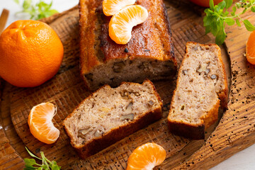 Vegan cake with tangerine and fresh fruit.