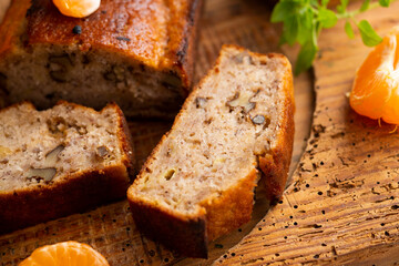 Vegan cake with tangerine and fresh fruit.