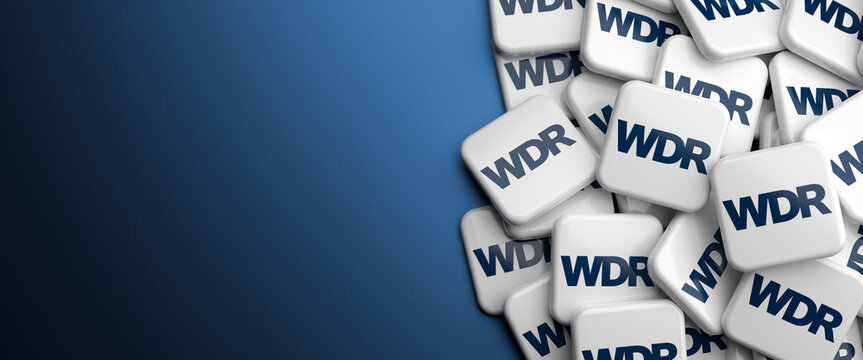 Logos of the German Regional Public Broadcaster "Westdeutscher Rundfunk" WDR (Westgerman Broadcasting) for the German state North Rhine-Westphalia on a heap.