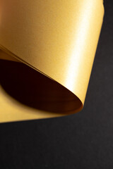 Gold warping paper for decoration on black