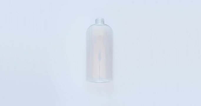 Empty transparent plastic bottles and containers. 4K stop motion animation