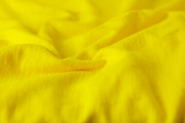 Abstract background yellow texture cotton fabric. Wrinkled cotton fabric background with wave pattern. Vintage or retro luxury look. Grunge background. Close up photo.3