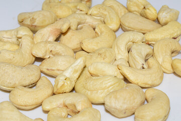 roasted cashew nuts isolated on white background