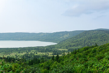 Obraz premium natural landscape of Kunashir island, view of the Golovnin volcano caldera with hot lakes