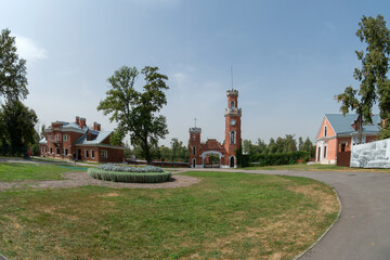 Ramon, Voronezh Region, Entrance gate with a tower and clock. The palace complex of the...