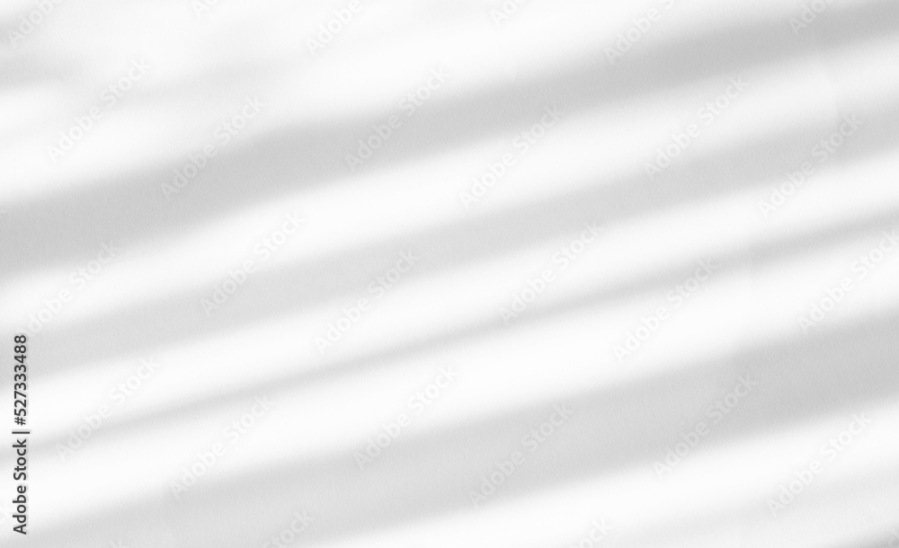 Aufkleber an abstract shadow from the blinds falling from the window on a light background. copy space. the pe