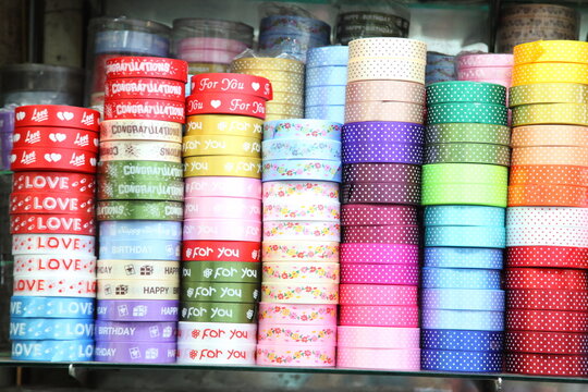 Colorful fabric ribbon tapes in shop