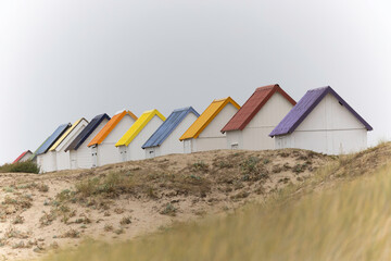 Beach cabins in Gouville sur Mer, Manche, Normandy, France in various lights