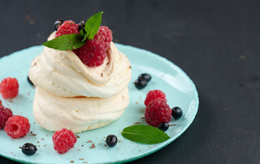 Baked cake made from whipped chicken protein and cream, decorated with fresh berries