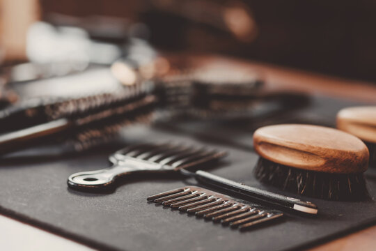 Brush and razor for shaving beard. Concept background of hair salon men, barber shop, vintage color