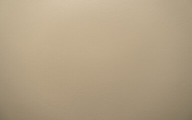 Light yellow cement walls in the room