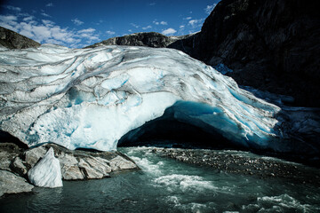 Fonte des glaciers suite au réchauffement climatique, glacier du Nigardsbreen - obrazy, fototapety, plakaty