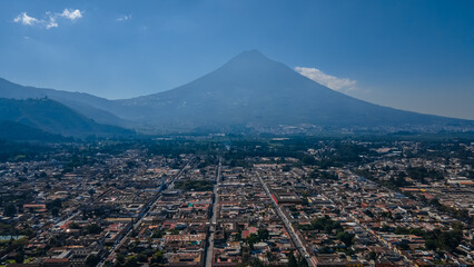 Beautiful aerial cinematic footage of the Antigua City in Guatemala, Its yellow church, the Santa...