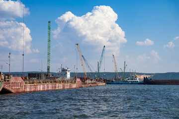 Construction of a bridge over the Volga River. The bridge is part of the new M12 Moscow-Nizhny Novgorod-Kazan highway. Construction of bridge piers.