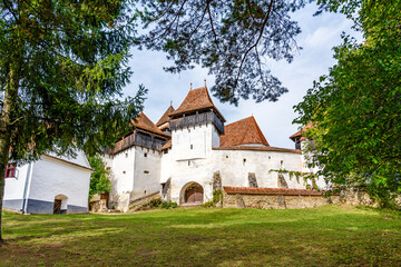 Fototapeta na wymiar Fortified church in Viscri village, Brasov country, Transylvania, Romania; medieval saxon fortified evangelical church
