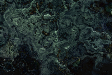 Texture of dark green marble with white veins. Abstract green marble. Glossy marble stone texture...