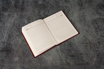 A diary on a stone surface. Clean sheets