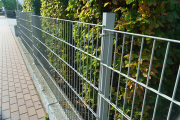 Fencing or fence on the sidewalk in a small European city, Germany, Austria