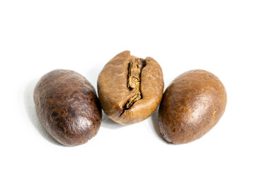 roasted coffee beans on white background