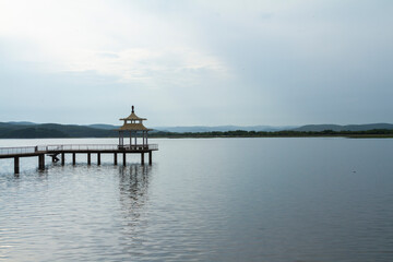 Fototapeta na wymiar Jingbo Lake in Heilongjiang, China. Wetland and Mountain landscape.