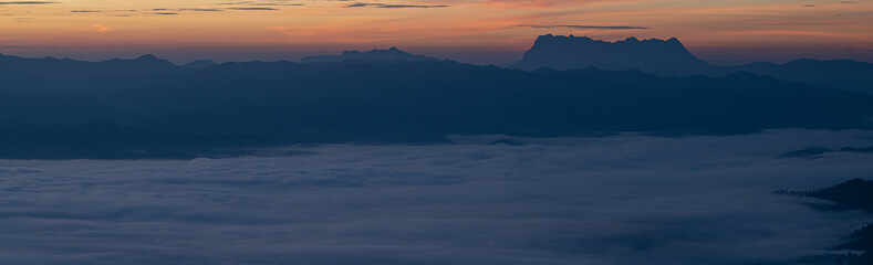 Fototapeta na wymiar morning and sunrise on the winter season over the mountain layer at chingmai , thailand.