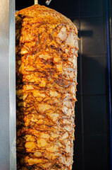 Meat on skewer for doner, traditional Turkish food