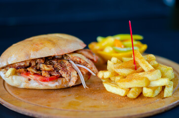 Chicken doner kebab in bread. french fries. selective focus
