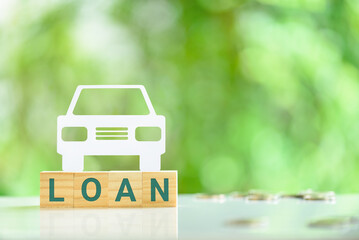 Car or auto loan, financial concept : Sedan car on wood blocks with the word LOAN. An auto loan is a secured loan, which means that the value of the vehicle serves as security for the bank or lender. - obrazy, fototapety, plakaty