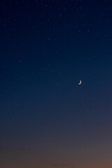 moon and stars background at twilight. 