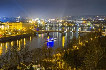 Foto op Plexiglas A night view of Prague and its rooftops © Lubos