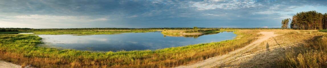 Pastoral landscape on the banks of the river in Belarus