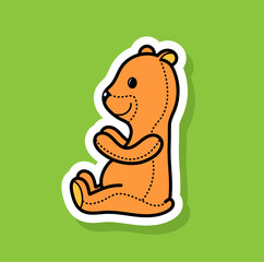 Cute children's teddy bear on a green background. Cool sticker.