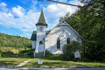 Fototapeta na wymiar Abandoned white church in Parksville, New York in the Catskills
