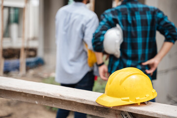 The importance of safety gear for construction workers and the presence of a helmet at a construction site