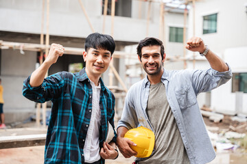 After completing their mission or building, a group of engineers and employees raise their hands.