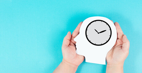 Silhouette of a head with a clock, time pressure and management in business, having a deadline or...