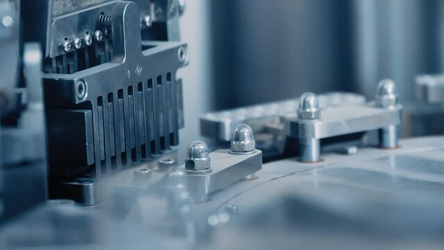 Automatic capsule filling machine, capsule filling device. Production line at a pharmaceutical company. The machine fills the capsule with contents. Production of drugs in tablets. Close up, DOF, 4K