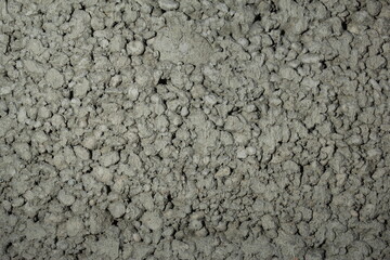 close up of a gray foam concrete building block. grey textured background