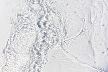 Caustics on water surface. Natural water rippling caustics with sunlight reflections. Water surface...