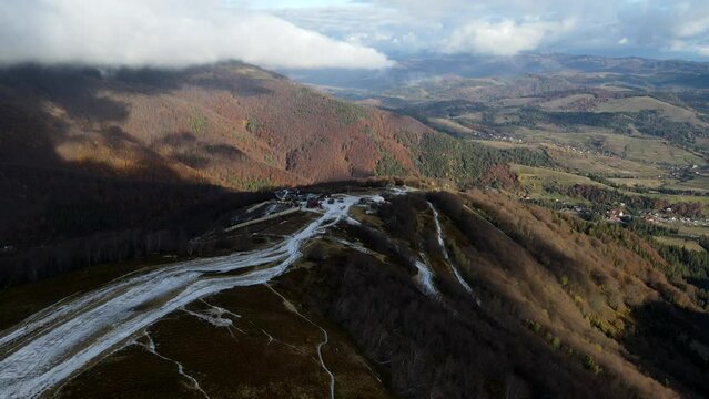 aerial view of travel landmark autumn mountains with snow