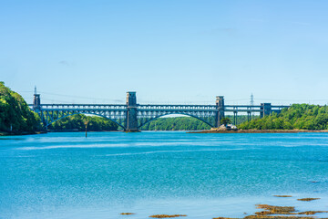 View of Pont Brittania bridge across the Menai Strait between the island of Anglesey and mainland Wales