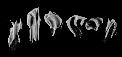 Set foam smeared, shaving cream bubble isolated on black background, with clipping path texture,...