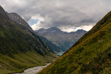 Fototapeta premium Impressive alpine view of high peaks in summer