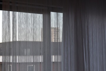 Building behind curtains