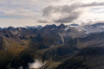 Alpine mountain peaks covered in clouds